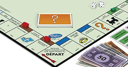 Monopoly board with house and hotels